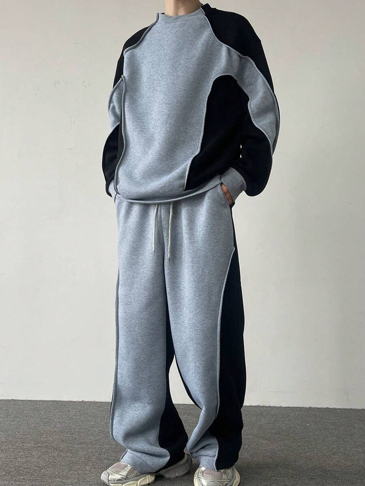Men's two-tone tracksuit set with crew-neck top and wide-leg pants