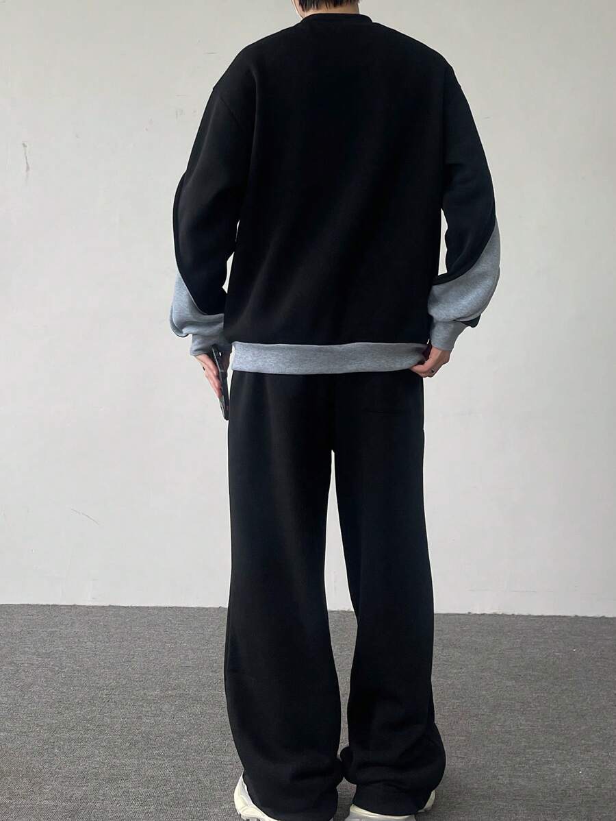 Men's two-tone tracksuit set with crew-neck top and wide-leg pants