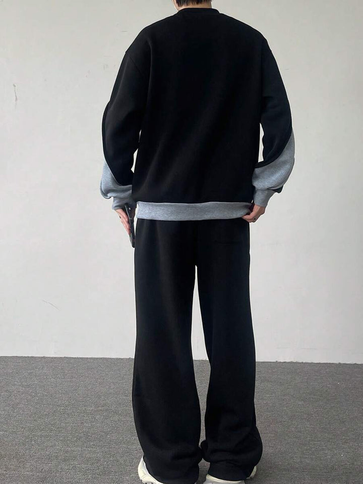Men's two-tone tracksuit set with crew-neck top and wide-leg pants
