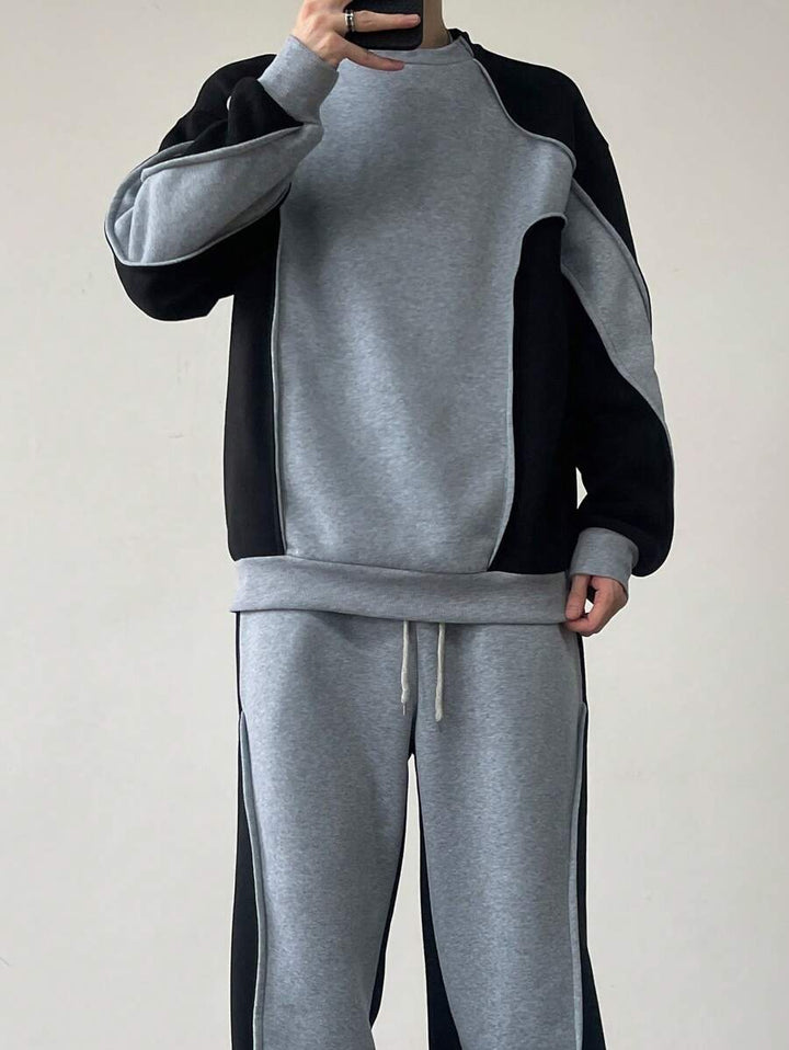 Men's two-tone tracksuit set with crew-neck top and wide-leg pants