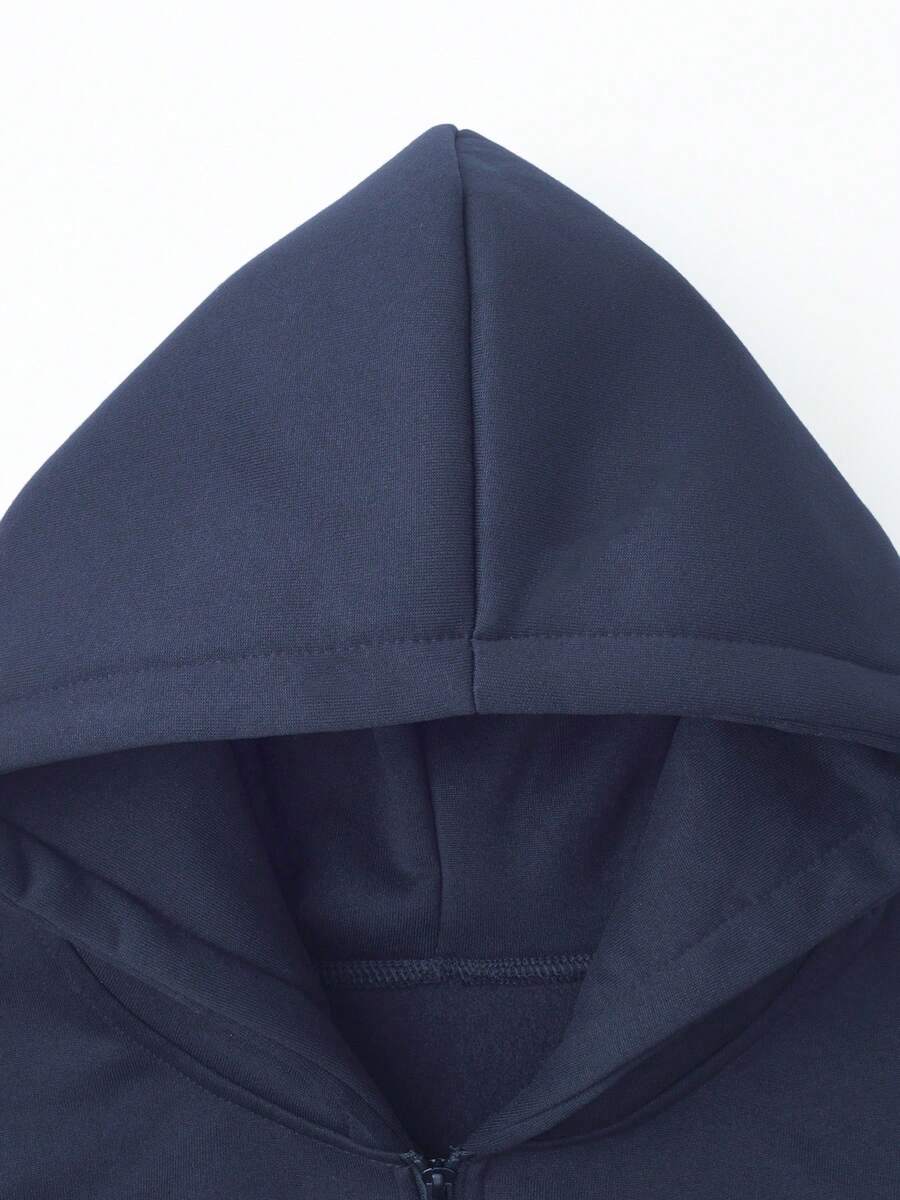 Herren-Trainingsanzug mit Kapuze, halbem Reißverschluss und weiter Hose