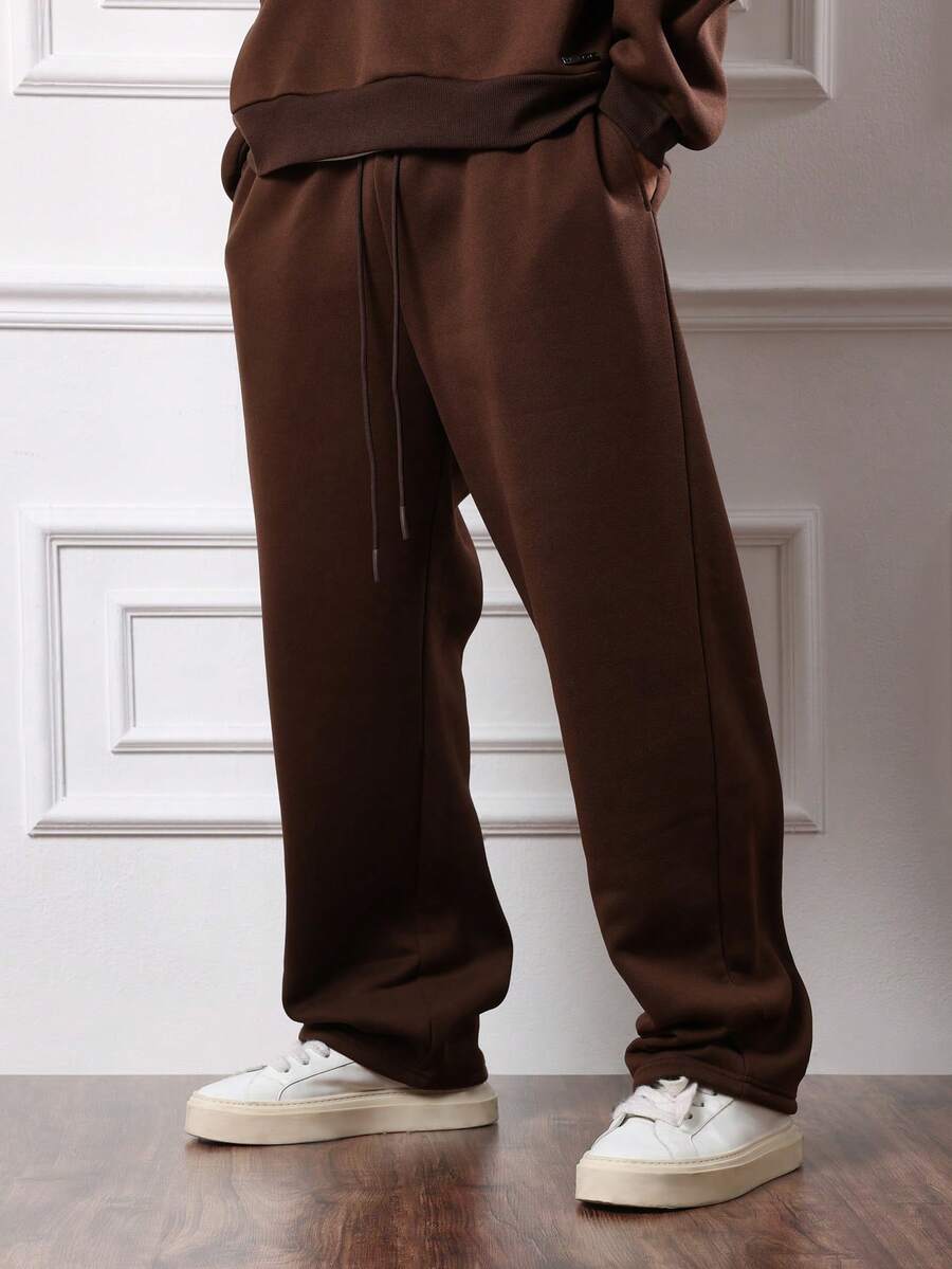 Herren-Trainingsanzug mit Kapuze und halbem Reißverschluss sowie Hose mit Kordelzug