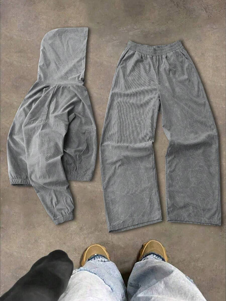 Herren-Trainingsanzug mit Kapuze, locker geschnitten, und weiter Hose