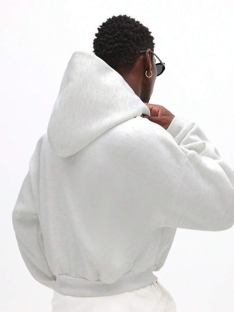 Kurzer Herren-Kapuzenpullover mit Reißverschluss, Kordelzug und Vordertaschen