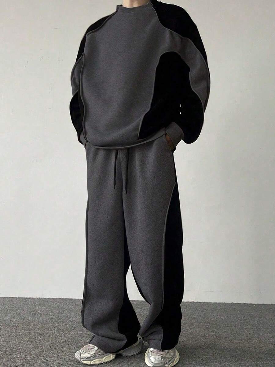 Men's two-tone tracksuit set with crew-neck top and wide-leg pants