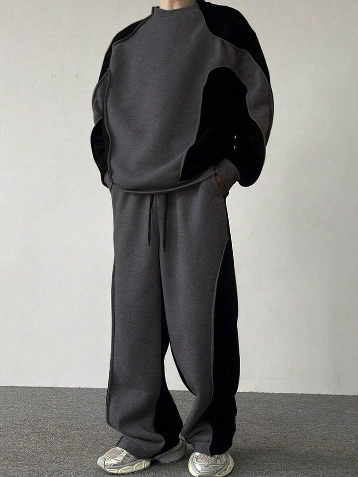 Men's two-tone tracksuit set with crew-neck top and wide-leg pants