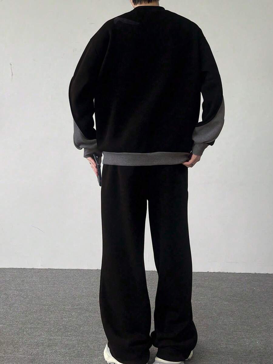 Men's two-tone tracksuit set with crew-neck top and wide-leg pants