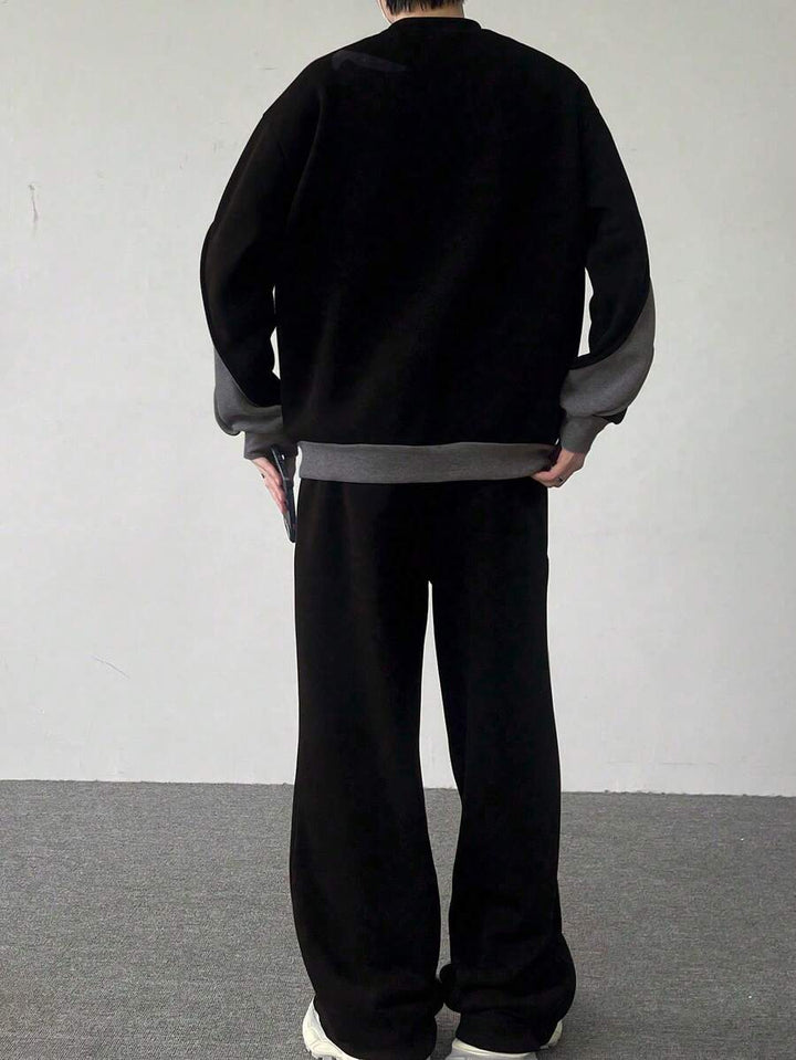 Men's two-tone tracksuit set with crew-neck top and wide-leg pants