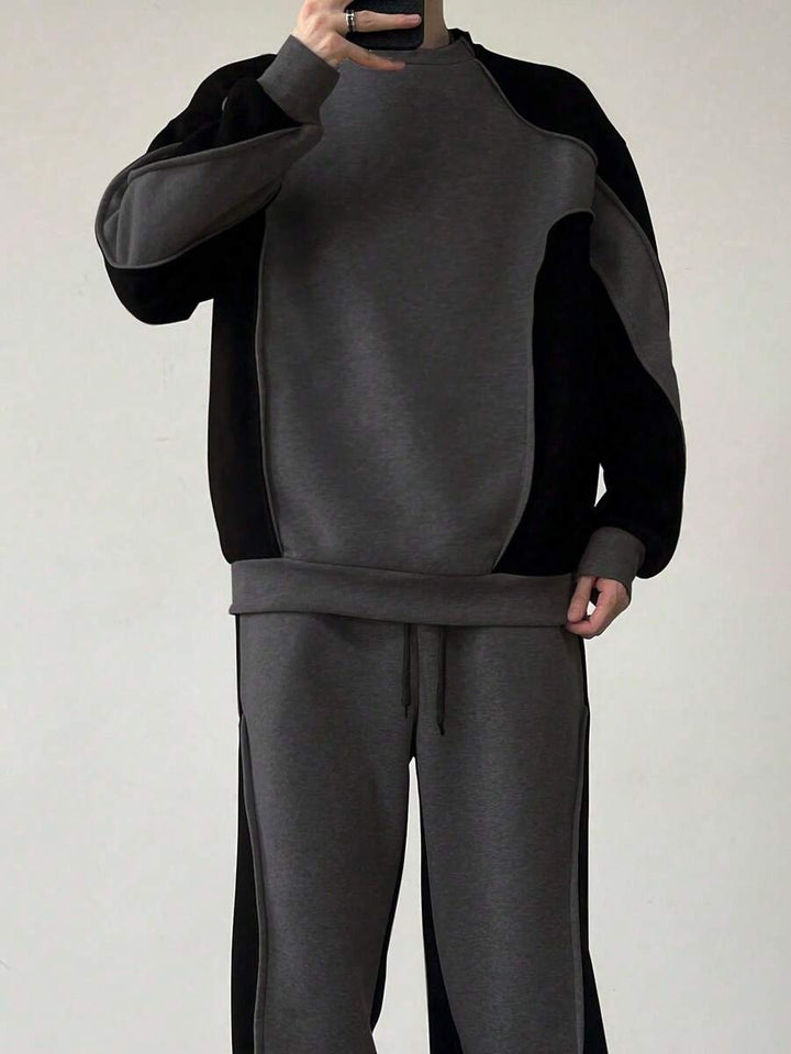 Men's two-tone tracksuit set with crew-neck top and wide-leg pants