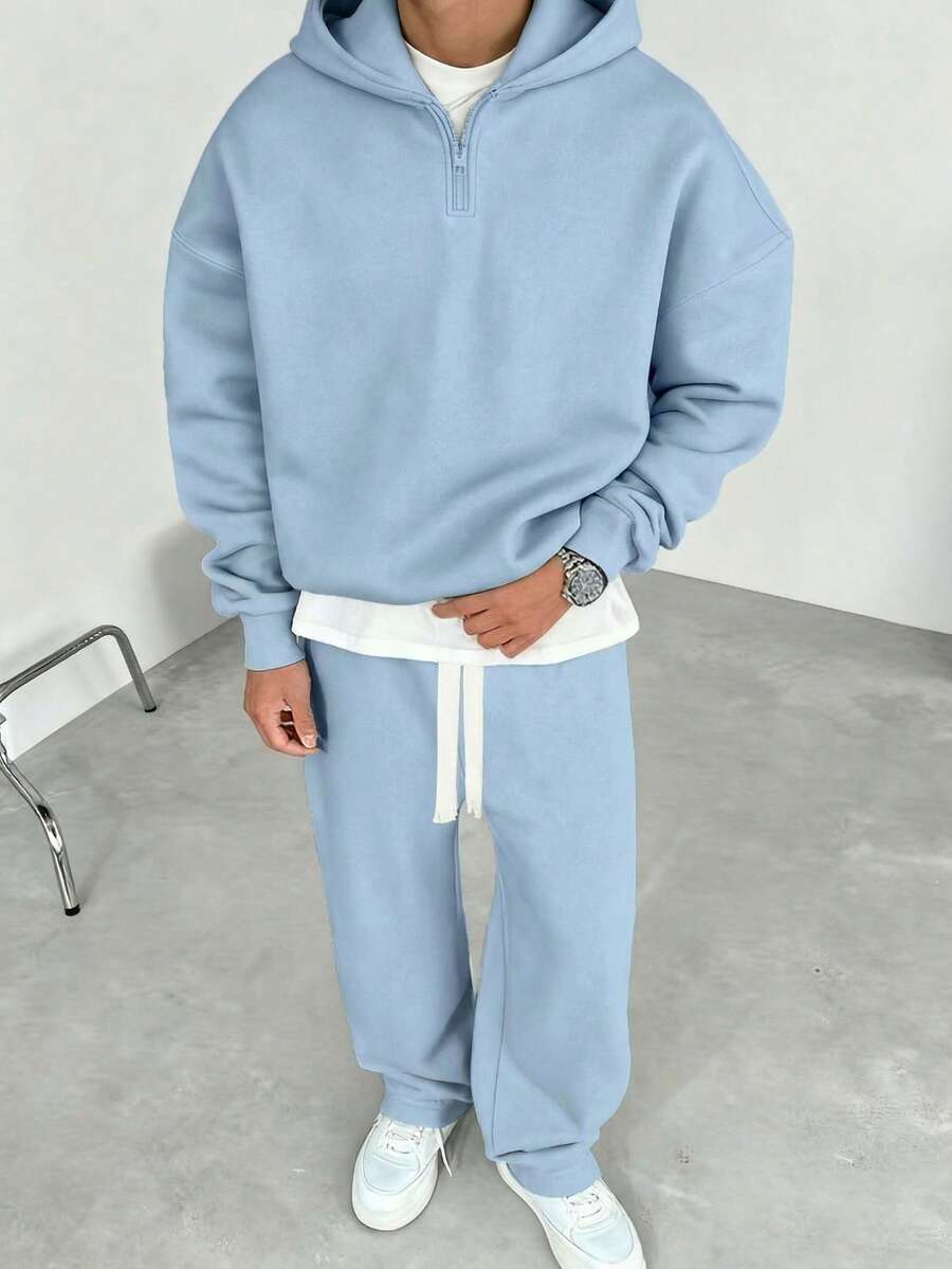 Herren-Trainingsanzug mit Kapuze, halbem Reißverschluss und weiter Hose