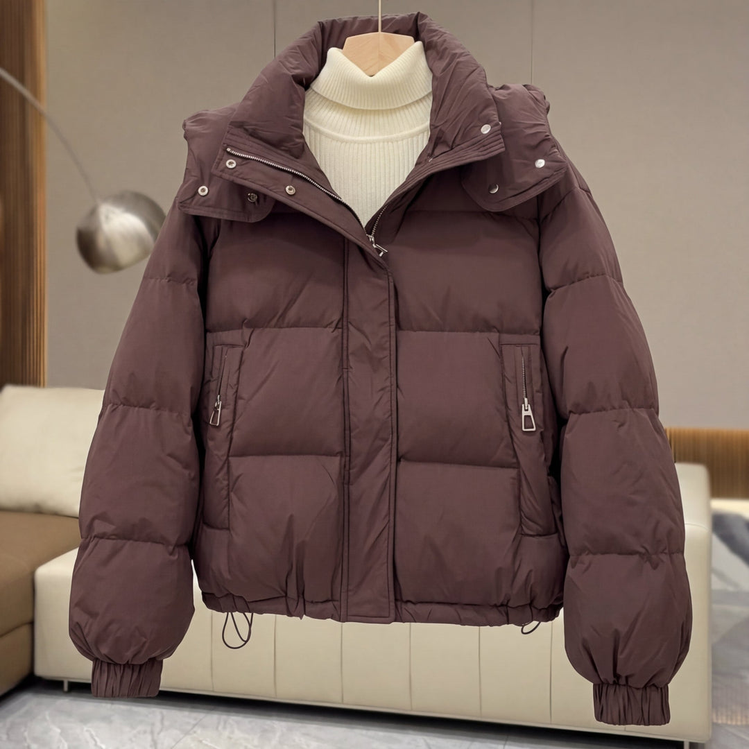 Piumino corto oversize da donna con collo alto e chiusura con cerniera