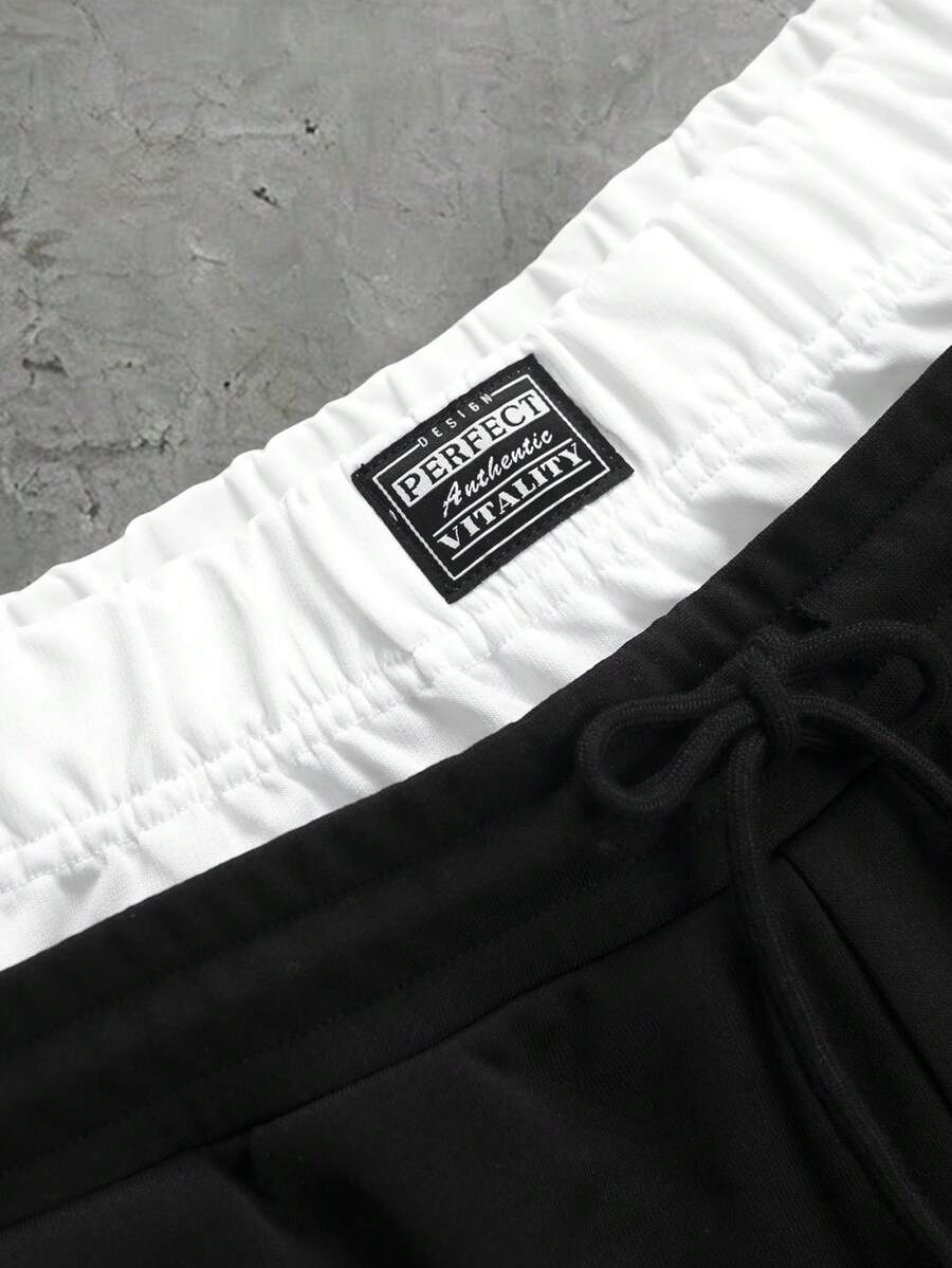 Herren-Trainingsanzug mit Rundhalsausschnitt, Gothic-Print und weiter Hose