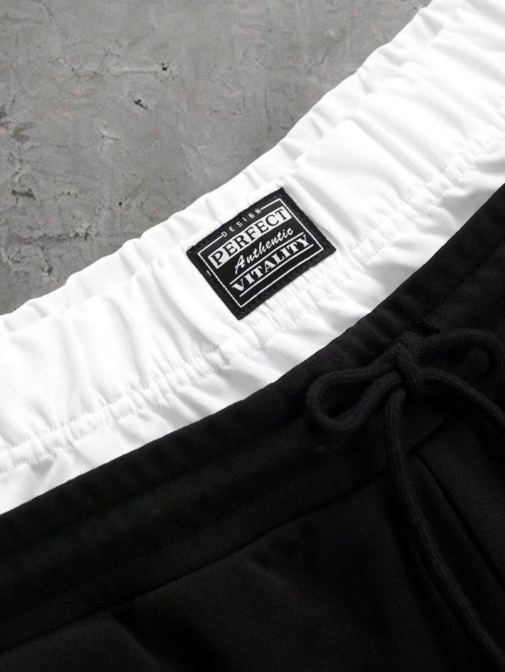 Herren-Trainingsanzug mit Rundhalsausschnitt, Gothic-Print und weiter Hose