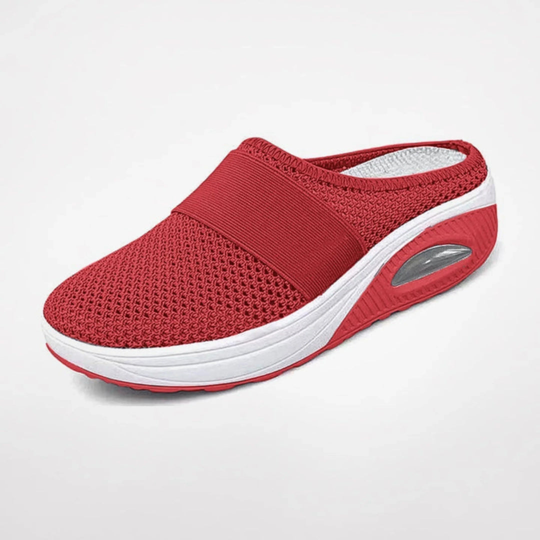 Chaussons Marguerite pour femme ergonomiques avec semelle antidérapante, soutien optimal pour la maison et les promenades douces.