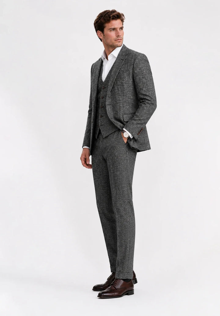 Completo uomo tre pezzi slim fit a spina di pesce con gilet abbottonato