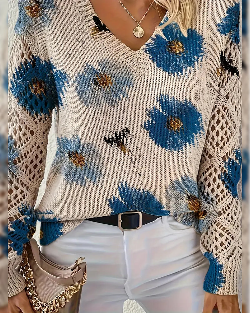 Damestrui van ajourgebreide stof met bloemenmotief - V-hals en lange mouwen
