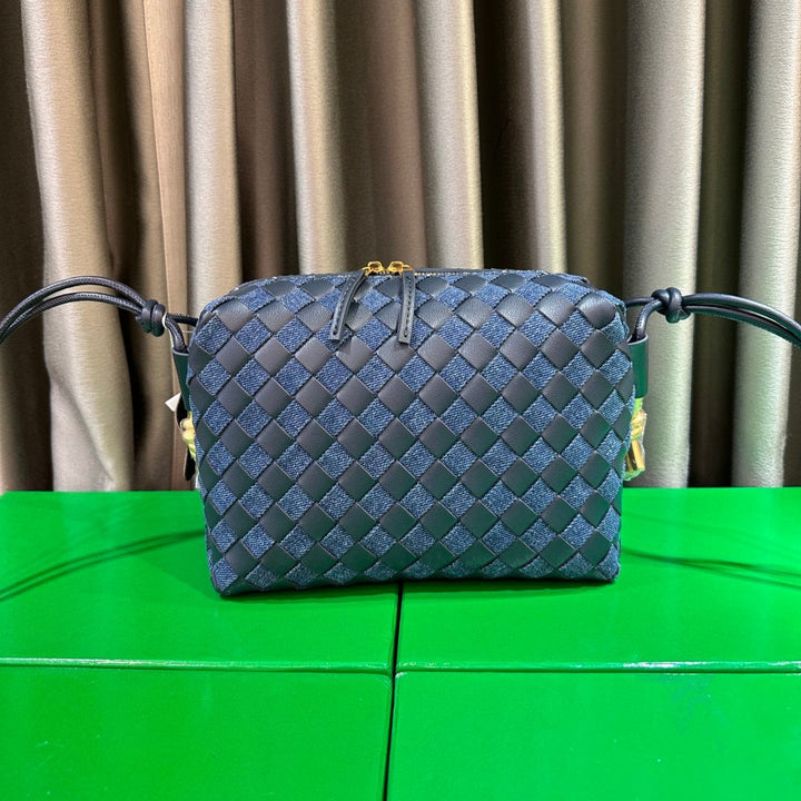 Women's denim and braided leather tote bag with handles