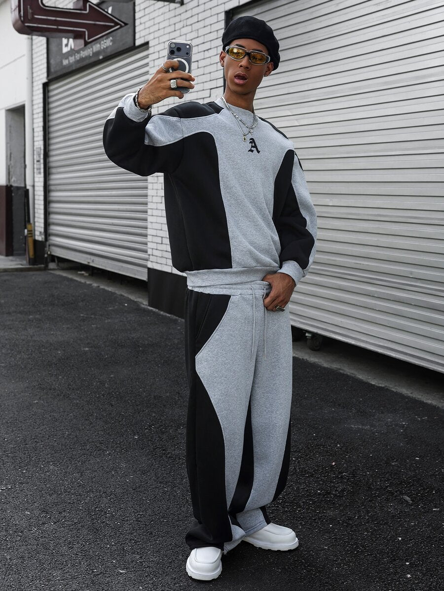 Men's two-tone tracksuit set with crew-neck top and wide-leg pants