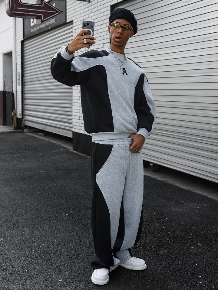 Men's two-tone tracksuit set with crew-neck top and wide-leg pants
