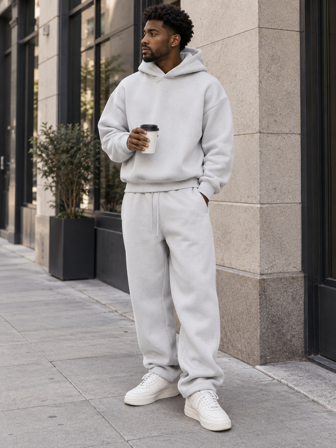 Oversized herenset met capuchon en joggingbroek met trekkoord