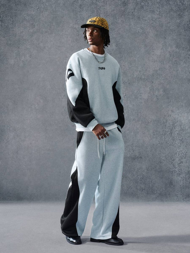 Men's two-tone tracksuit set with crew-neck top and wide-leg pants