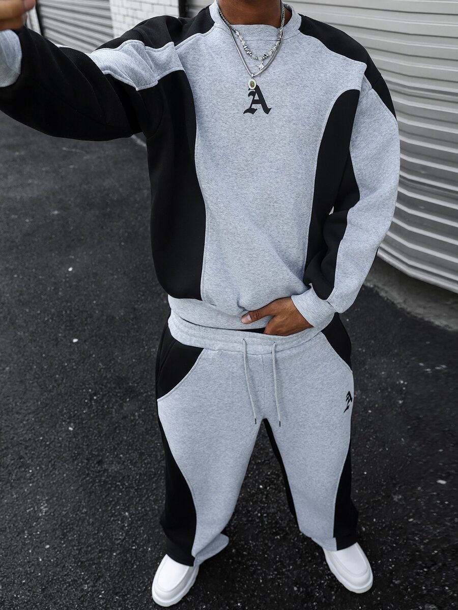 Men's two-tone tracksuit set with crew-neck top and wide-leg pants