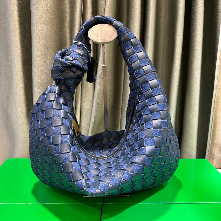 Women's denim and braided leather tote bag with handles