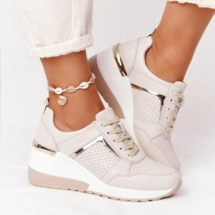 Baskets compensées Anaïs pour femme, effet compensé élégant et conception confortable pour un look sophistiqué au quotidien.