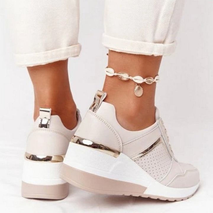 Baskets compensées Anaïs pour femme, effet compensé élégant et conception confortable pour un look sophistiqué au quotidien.