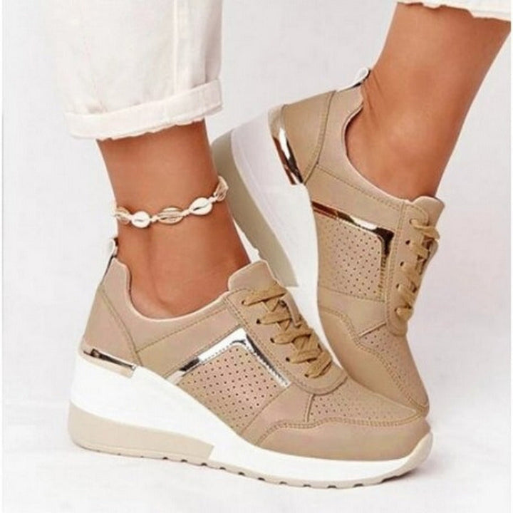 Baskets compensées Anaïs pour femme, effet compensé élégant et conception confortable pour un look sophistiqué au quotidien.