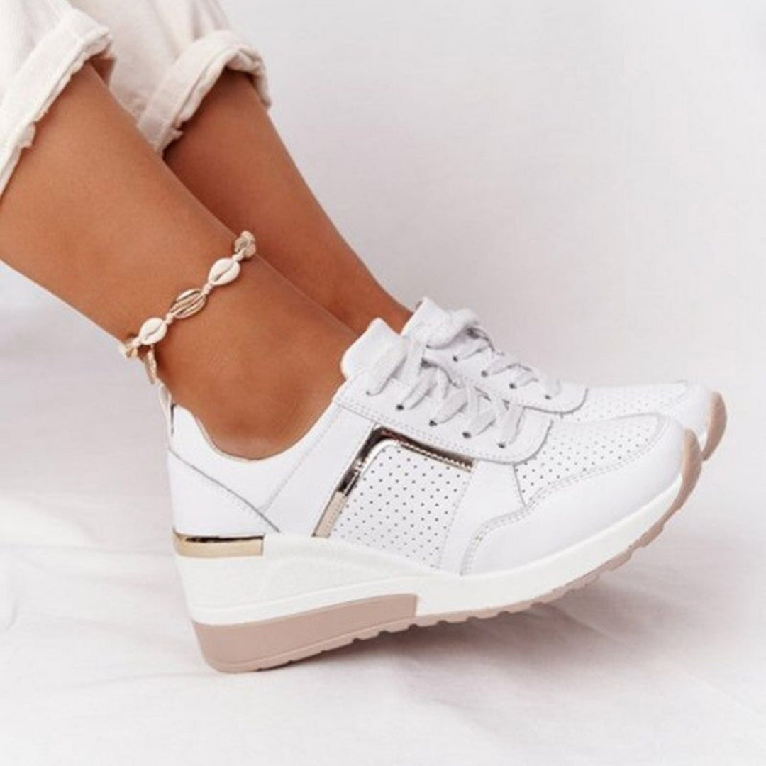 Baskets compensées Anaïs pour femme, effet compensé élégant et conception confortable pour un look sophistiqué au quotidien.