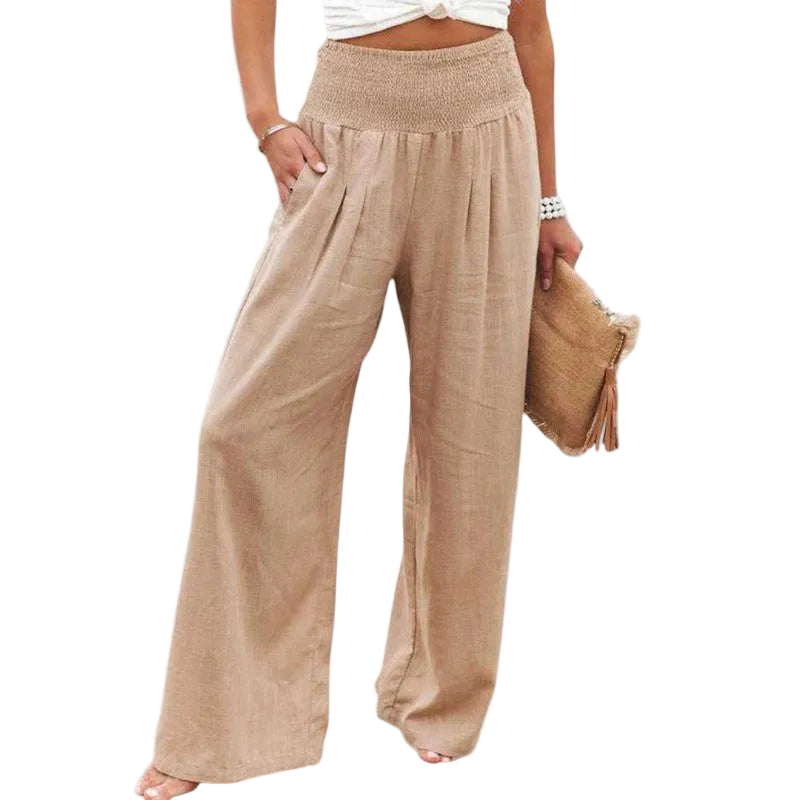 Ce pantalon léger et élégant est conçu pour offrir confort et style. Parfait pour les journées estivales, il présente une taille élastique et des plis flatteurs. À porter avec un top léger ou un t-shirt pour un look décontracté et chic.