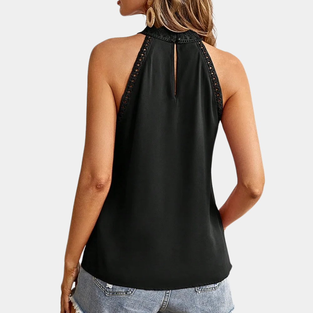 Vue arrière du débardeur Anissa pour femme, de couleur noire, avec un col haut orné de dentelle et une ouverture discrète dans le dos. Ce modèle moderne et élégant est parfait pour une tenue chic et sophistiquée.