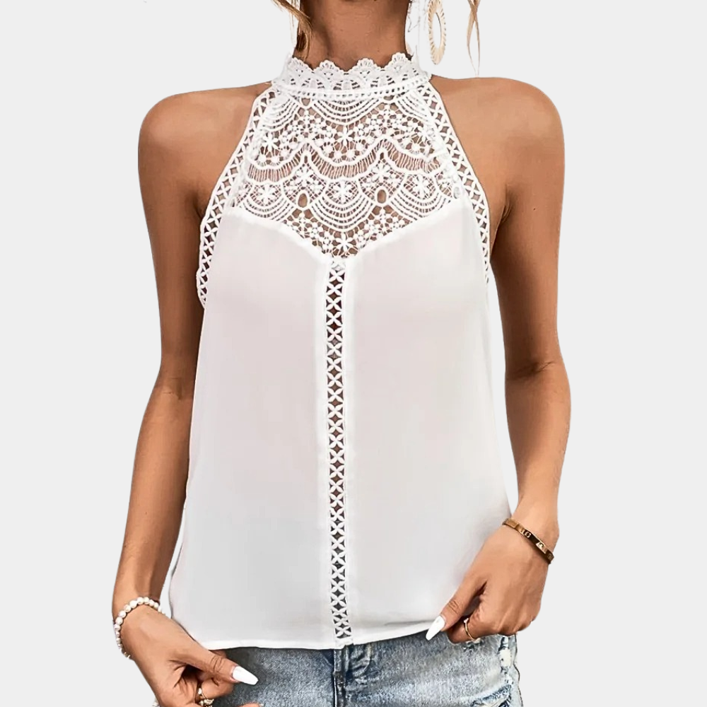 Débardeur Anissa pour femme, de couleur blanche, avec un col haut et une jolie dentelle délicate. Ce modèle moderne et élégant est parfait pour un look estival raffiné, alliant confort et style.