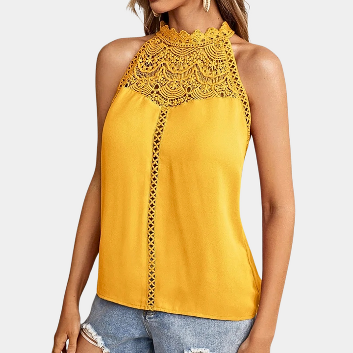 Débardeur Anissa pour femme, d'un joli jaune vif, avec un col haut et une dentelle raffinée. Ce modèle moderne et élégant est parfait pour apporter une touche de couleur et de style à vos tenues estivales.