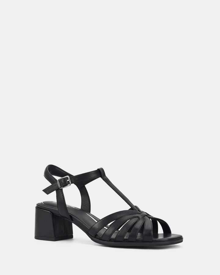 Sandales à bride cheville et talon bloc pour femmes. Design moderne avec des lanières croisées en cuir et un talon bloc confortable, parfait pour ajouter une touche d'élégance et de soutien à vos tenues estivales.
