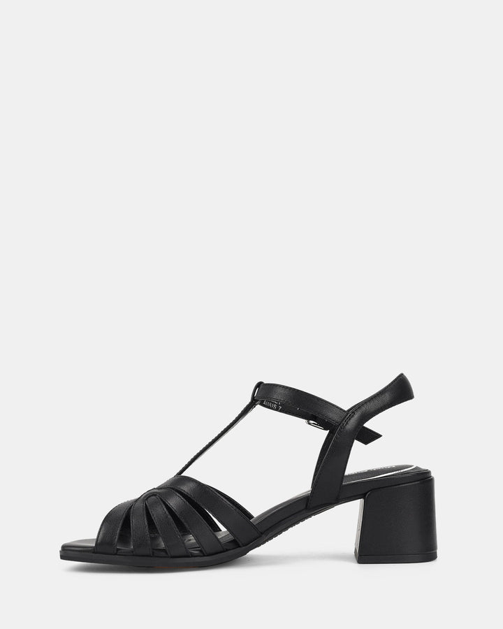 Sandales à bride cheville et talon bloc pour femmes. Design moderne avec lanières croisées et talon bloc stable pour un look élégant et confortable, parfait pour les journées d'été.