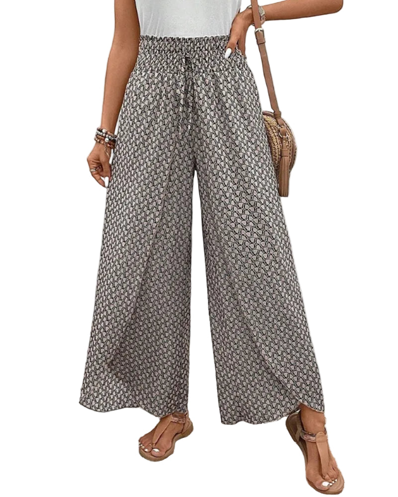 pantalon à coupe large avec taille élastiquée et motif géométrique dans des tons neutres, parfait pour un look décontracté et moderne. À associer avec un top léger pour un style estival confortable.