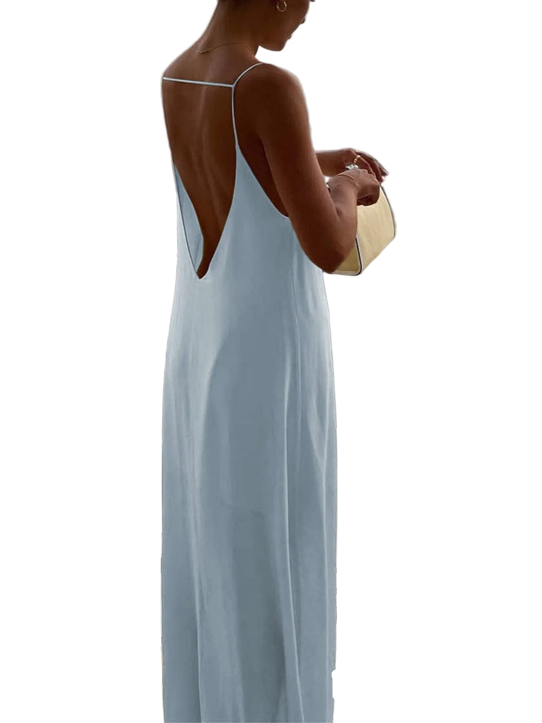 Robe nuisette dos nu Chiara pour femme, luxueuse et tendance. Cette robe longue bleu clair, au dos nu élégant et à la coupe fluide, offre un look raffiné et chic. Parfaite pour une soirée estivale ou un événement spécial, elle allie confort et sophistication dans un style moderne et féminin.