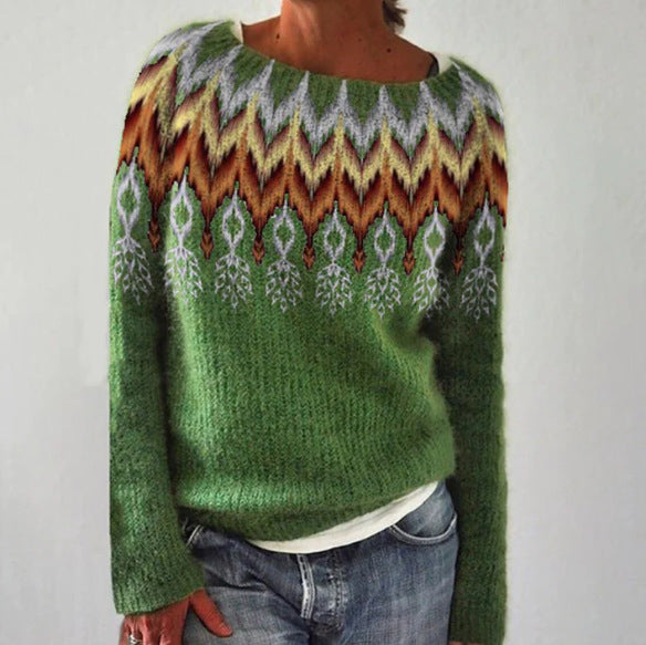 Un pull vintage pour femme de couleur verte, avec un motif géométrique et floral multicolore sur le haut. Ce modèle présente des nuances de vert, orange, jaune et blanc, avec un col rond et des manches longues. Un pull parfait pour l'hiver, alliant chaleur et originalité pour un look unique.