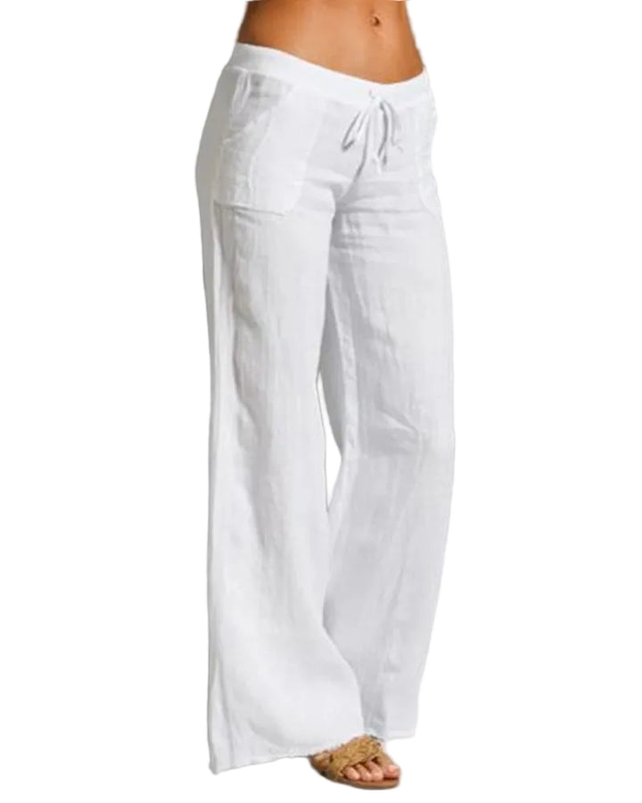 Pantalon large femme blanc, coupe fluide à jambes évasées avec taille élastique et cordon de serrage, tissu léger et confortable style tendance pour l’été.