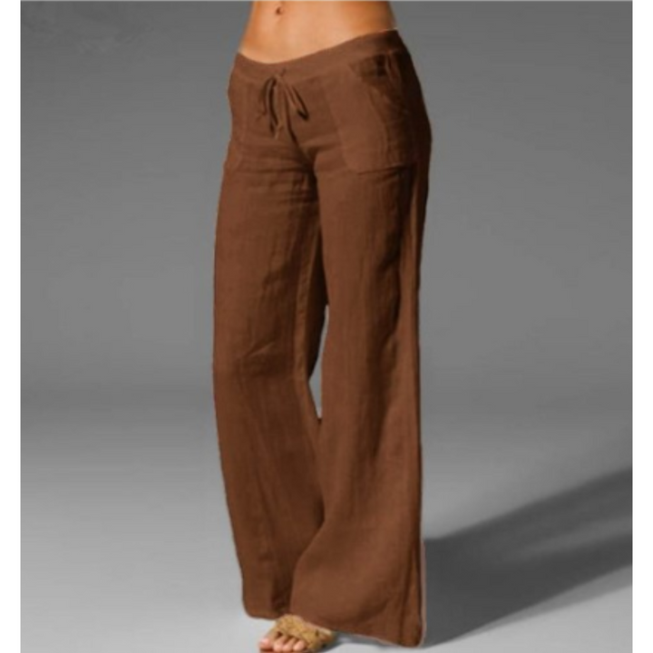 Pantalon large femme marron, coupe fluide à jambes évasées avec taille élastique et cordon de serrage, tissu léger et confortable look tendance pour l’été.