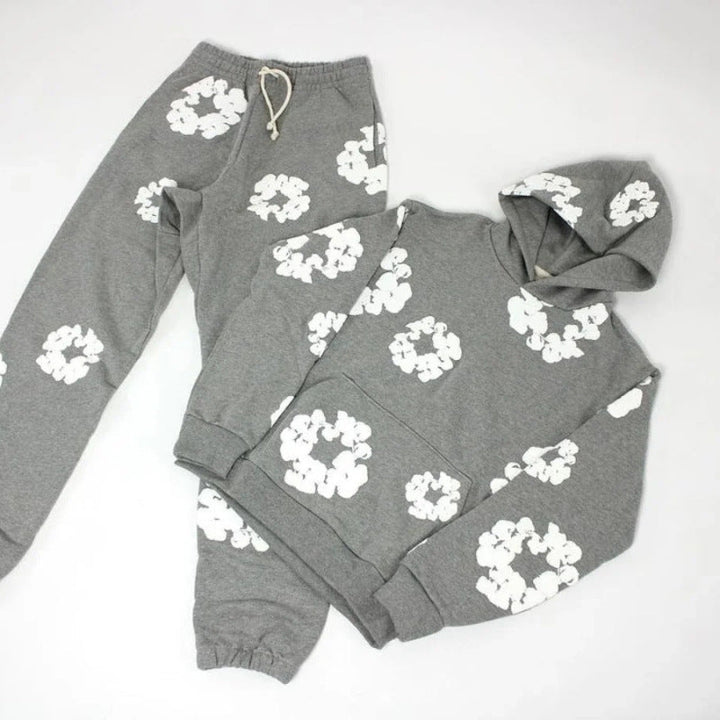 Unisex-Trainingsanzug mit Kapuze und Blumenmuster sowie Jogginghose