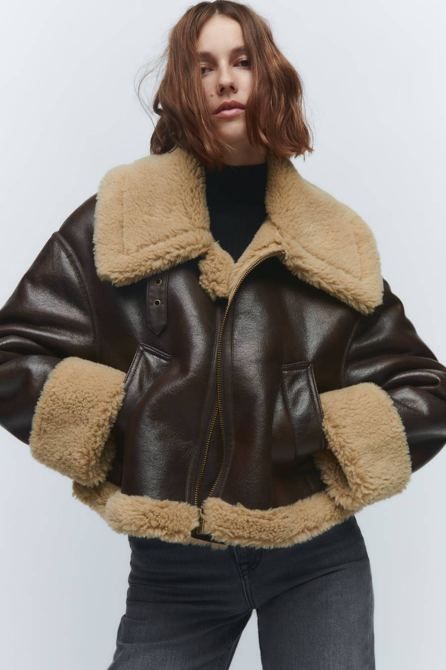 Women's genuine lambskin leather jacket in black with faux fur collar