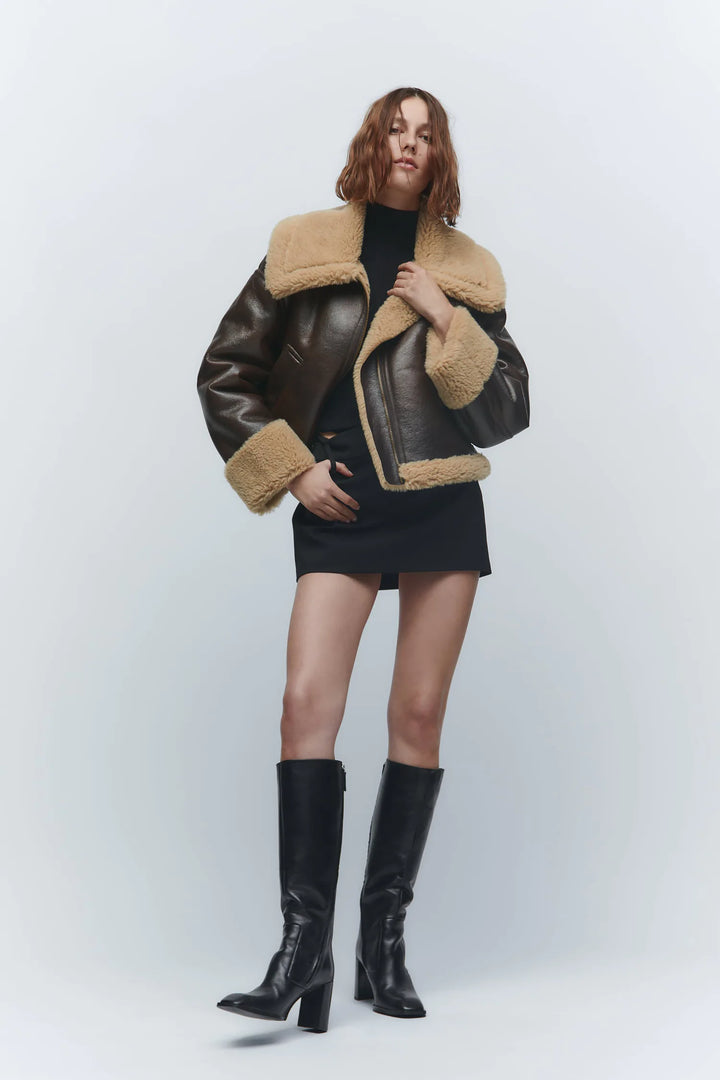 Women's genuine lambskin leather jacket in black with faux fur collar