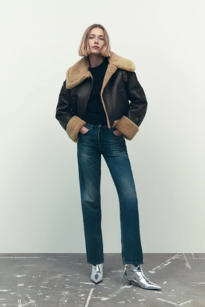 Women's genuine lambskin leather jacket in black with faux fur collar