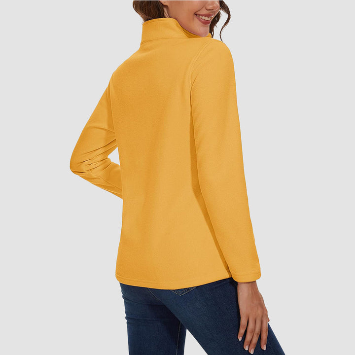 Pile da donna con collo alto e mezza zip