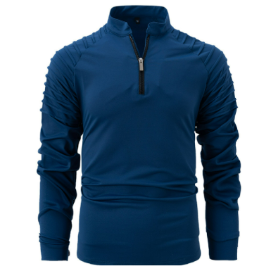Polo à manches longues pour homme, de couleur bleue avec un col zippé et des détails texturés sur les épaules. Ce modèle élégant et sportif est idéal pour un look moderne et dynamique.