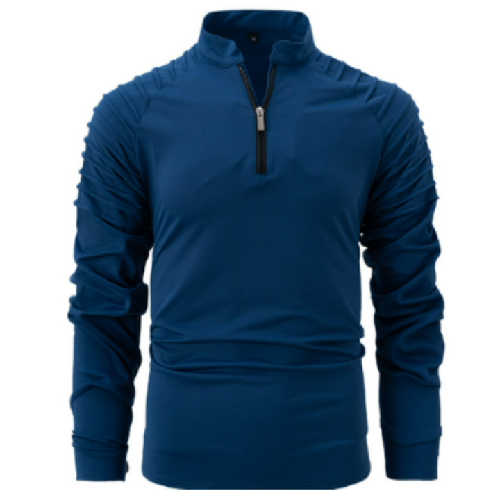 Polo à manches longues pour homme, de couleur bleue avec un col zippé et des détails texturés sur les épaules. Ce modèle élégant et sportif est idéal pour un look moderne et dynamique.
