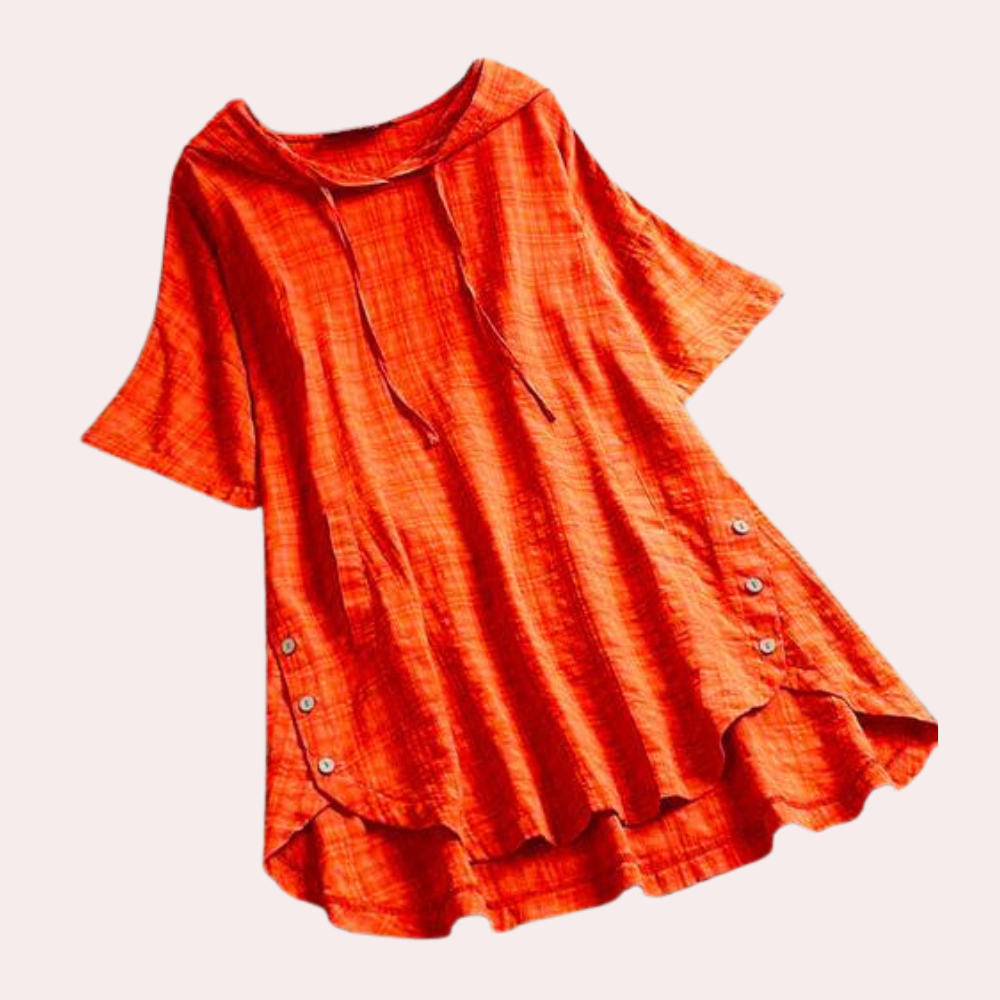 Chemisier long ample Jihane pour femme, au style moderne et décontracté. Ce modèle orange à manches courtes, avec une capuche et des boutons sur les côtés, offre une coupe fluide et légère, parfaite pour un look à la fois tendance et confortable au quotidien.